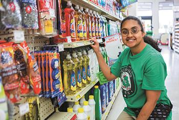 An EHG client receives on-the-job training at a Talladega area supermarket 