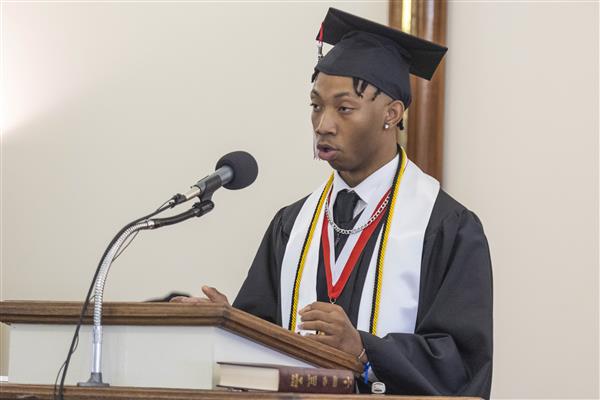 A 2023 Graduate from Alabama School for the Blind speaks to the audience.