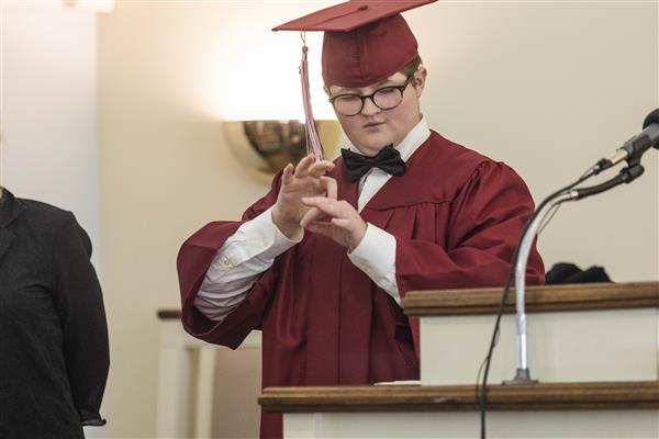A 2023 Graduate from Alabama School for the Deaf speaks to the audience.